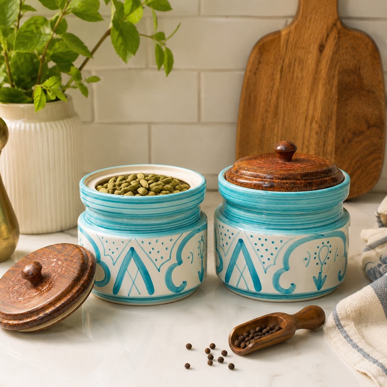 “Mrinmayi Ceramic Kitchen Canisters With Wooden Lids – Turquoise And Ivory Print (Set Of 2)” - Description For This Title
